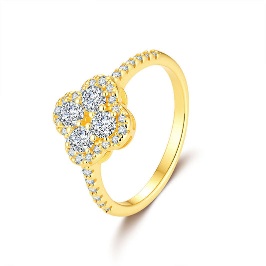 Gold halo ring with VVS moissanite center stone and pave band